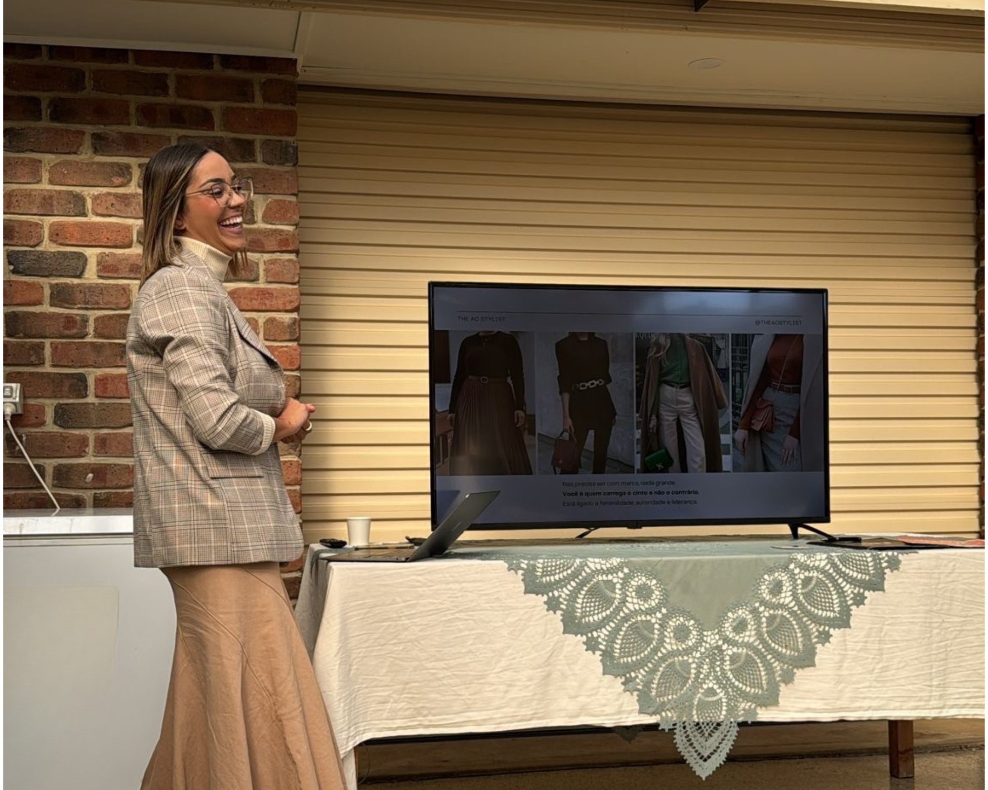 Anna on stage during a speaking event